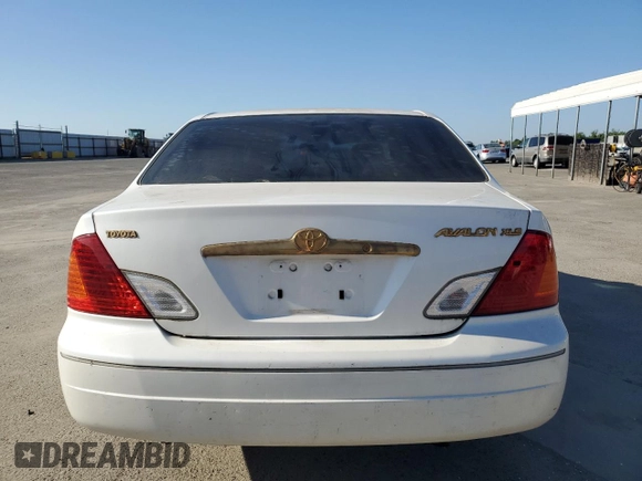 2001 Toyota Avalon XL with VIN 4T1BF28BX1U140913, listed as a Copart auction lot 56253065 with 110,880 mi miles and Clean Title. Bid and sale history available at DreamBid. Image 6.