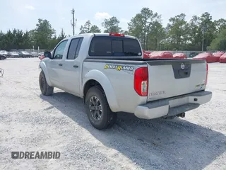 2017 Nissan Frontier Desert Runner with VIN 1N6DD0ER1HN704698, listed as a IAAI auction lot 42296137 with 166,783 mi miles and . Bid and sale history available at DreamBid. Image 3.