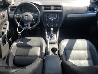 2012 Volkswagen Jetta SEL with VIN 3VWLP7AJ0CM327814, listed as a Copart auction lot 52235685 with 97,705 mi miles and Salvage title. Bid and sale history available at DreamBid. Image 8.
