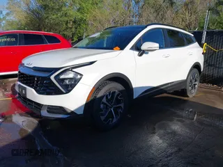 2023 Kia Sportage EX with VIN KNDPVCAG5P7077588, listed as a IAAI auction lot 42021931 with 26,195 mi miles and . Bid and sale history available at carsss.com. Image 21.