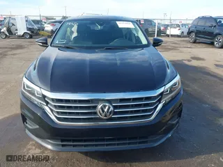 2021 Volkswagen Passat 2.0T SE with VIN 1VWSA7A39MC015718, listed as a IAAI auction lot 41233666 with 28,142 mi miles. Bid and sale history available at carsss.com. Image 12.
