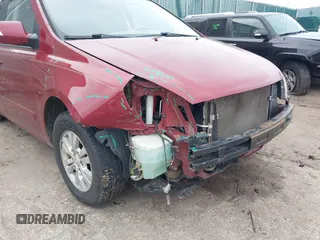 2012 Kia Sedona LX with VIN KNDMG4C75C6422392, listed as a IAAI auction lot 41235462 with 211,653 mi miles. Bid and sale history available at carsss.com. Image 6.