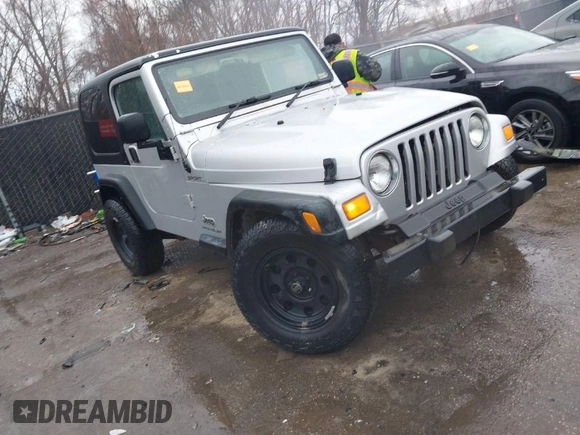 2006 Jeep Wrangler Sport Right Hand Drive with VIN 1J4F449SX6P764491, listed as a IAAI auction lot 41709726 with 290,798 mi miles. Bid and sale history available at carsss.com. Image 1.