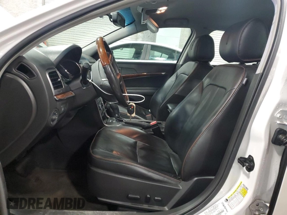 2012 Lincoln MKZ with VIN 3LNHL2GCXCR821600, listed as a Copart auction lot 49785545 with 157,686 mi miles and Salvage Title. Bid and sale history available at DreamBid. Image 7.