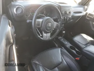 2013 Jeep Wrangler Sahara with VIN 1C4AJWBG8DL602065, listed as a Copart auction lot 52082535 with 110,727 mi miles and Salvage title. Bid and sale history available at DreamBid. Image 8.