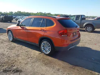 2013 BMW X1 28i with VIN WBAVM1C58DVW45105, listed as a IAAI auction lot 42049919 with 141,020 mi miles. Bid and sale history available at carsss.com. Image 3.