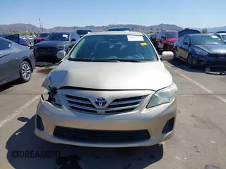 2013 Toyota Corolla L with VIN 5YFBU4EEXDP176123, listed as a IAAI auction lot 42003927 with 180,319 mi miles and . Bid and sale history available at DreamBid. Image 12.