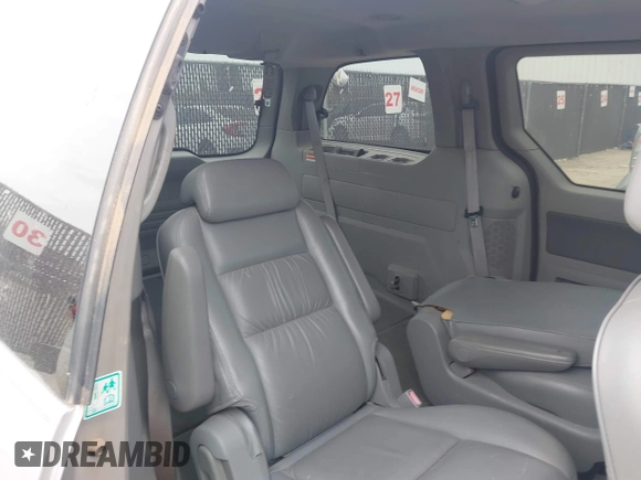 2006 Ford Freestar SEL z VIN 2FMZA52216BA05064, wystawiony jako IAAI lot #42058806 z przebiegiem 157 991 mil mil oraz . Historia ofert i sprzedaży dostępna na DreamBid. Obrazek 8.
