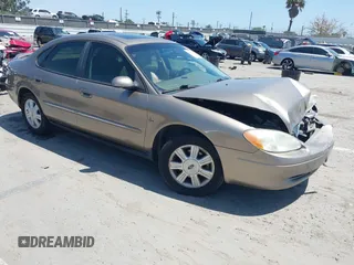 2003 Ford Taurus SEL Deluxe with VIN 1FAHP56S73A108396, listed as a IAAI auction lot 42316288 with 129,033 mi miles and . Bid and sale history available at DreamBid. Image 1.