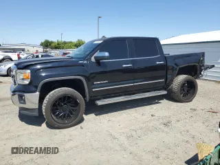 2014 GMC Sierra 1500 SLT with VIN 3GTU2VEC0EG191952, listed as a Copart auction lot 61819235 with 149,476 mi miles and Salvage title. Bid and sale history available at DreamBid. Image 1.
