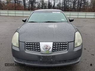 2004 Nissan Maxima SE with VIN 1N4BA41E14C901248, listed as a Copart auction lot 52100375 with 124,473 mi miles and Salvage Title. Bid and sale history available at DreamBid. Image 5.