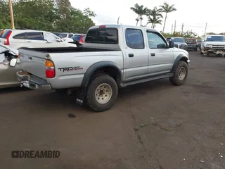 2003 Toyota Tacoma PreRunner z VIN 5TEGN92N63Z170929, wystawiony jako IAAI lot #41778256 z przebiegiem 202 135 mil mil oraz . Historia ofert i sprzedaży dostępna na DreamBid. Obrazek 4.