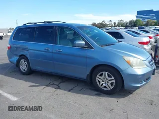 2006 Honda Odyssey EX-L z VIN 5FNRL38706B075356, wystawiony jako IAAI lot #42021960 z przebiegiem 120 455 mil mil oraz . Historia ofert i sprzedaży dostępna na DreamBid. Obrazek 13.