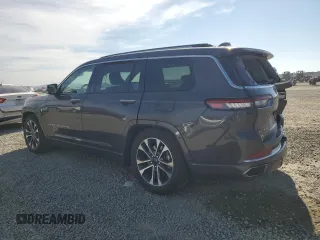 2022 Jeep Grand Cherokee Overland with VIN 1C4RJKDG2N8536125, listed as a Copart auction lot 50843965 with 70,865 mi miles and Salvage title. Bid and sale history available at DreamBid. Image 2.