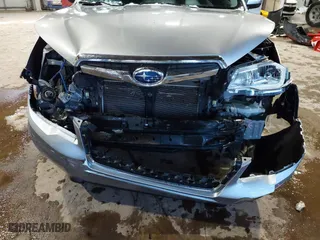 2015 Subaru Forester 2.5i Touring with VIN JF2SJAUCXFH471892, listed as a IAAI auction lot 41314722 with 94,717 mi miles. Bid and sale history available at carsss.com. Image 6.