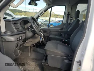 2021 Ford Transit with VIN 1FDAX2CG2MKA23709, listed as a Copart auction lot 74054214 with 105,503 mi miles and Salvage Title. Bid and sale history available at DreamBid. Image 7.