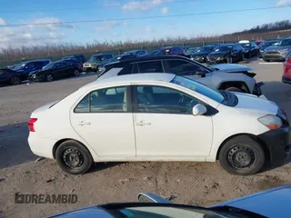 2008 Toyota Yaris with VIN JTDBT903284035531, listed as a IAAI auction lot 41591330 with 142,123 mi miles. Bid and sale history available at carsss.com. Image 13.