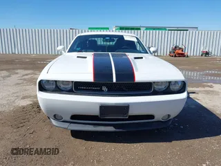 2011 Dodge Challenger z VIN 2B3CJ4DG5BH602787, wystawiony jako IAAI lot #41759684 z przebiegiem 128 055 mil mil oraz . Historia ofert i sprzedaży dostępna na DreamBid. Obrazek 12.
