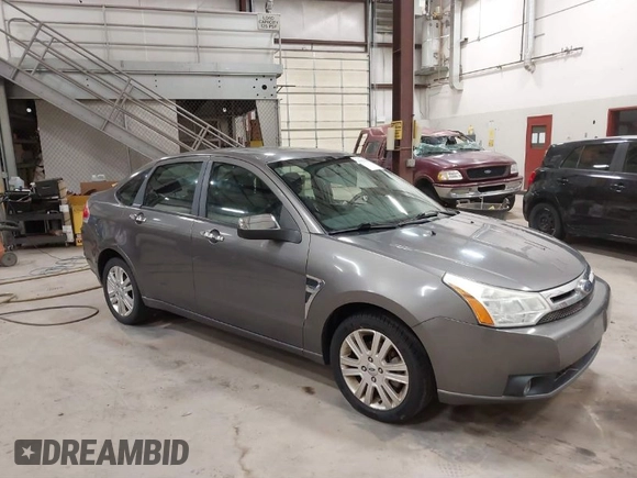 2009 Ford Focus SEL with VIN 1FAHP37N39W253086, listed as a IAAI auction lot 41825983 with 158,720 mi miles. Bid and sale history available at carsss.com. Image 1.