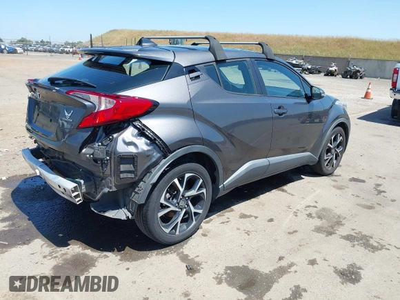 2018 Toyota C-HR XLE with VIN NMTKHMBXXJR047391, listed as a IAAI auction lot 42180973 with 140,674 mi miles and . Bid and sale history available at DreamBid. Image 4.