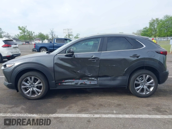 2024 Mazda CX-30 S Carbon Edition with VIN 3MVDMBCM5RM665341, listed as a IAAI auction lot 42180459 with 4,496 mi miles and . Bid and sale history available at DreamBid. Image 14.