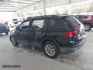 2019 Volkswagen Tiguan S with VIN 3VV1B7AX1KM073074, listed as a IAAI auction lot 41387775 with 57,045 mi miles. Bid and sale history available at carsss.com. Image 14.