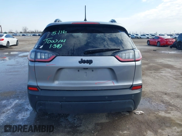 2021 Jeep Cherokee Altitude with VIN 1C4PJLLB6MD112830, listed as a IAAI auction lot 41560135 with 76,760 mi miles. Bid and sale history available at carsss.com. Image 17.