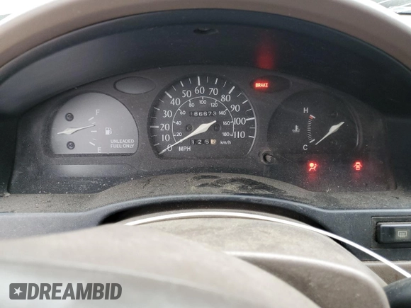 1996 Toyota Tercel DX z VIN JT2AC52L5T0145290, wystawiony jako Copart lot #45027855 z przebiegiem 186 673 mil mil oraz Szkoda całkowita • Salvage title. Historia ofert i sprzedaży dostępna na DreamBid. Obrazek 9.