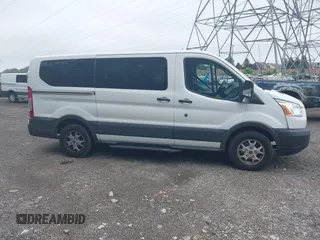 2015 Ford Transit XL with VIN 1FMZK1YM8FKB06431, listed as a IAAI auction lot 42653296 with 211,105 mi miles and . Bid and sale history available at DreamBid. Image 14.