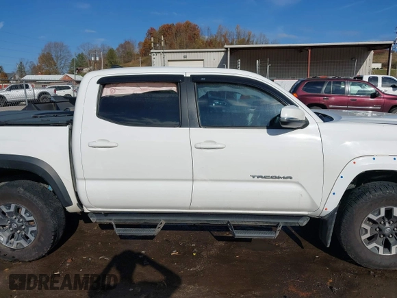 2017 Toyota Tacoma SR5 with VIN 3TMCZ5AN8HM063513, listed as a IAAI auction lot 40703177 with 42,323 mi miles and . Bid and sale history available at carsss.com. Image 14.