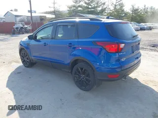 2019 Ford Escape SE with VIN 1FMCU9GD7KUB44070, listed as a IAAI auction lot 41801706 with 77,612 mi miles. Bid and sale history available at carsss.com. Image 3.