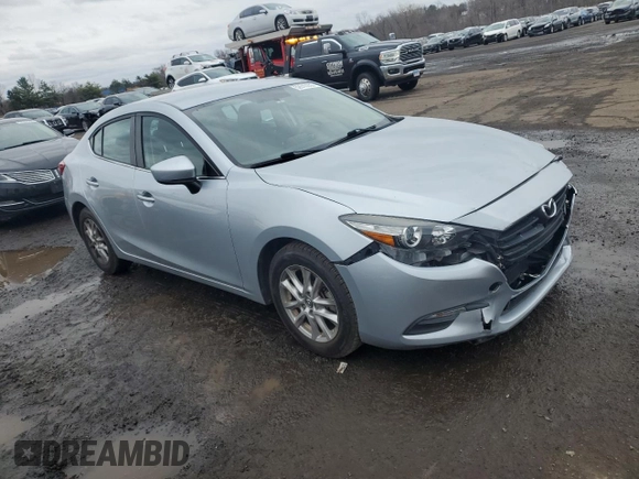 2017 Mazda 3 Sport with VIN 3MZBN1U75HM119823, listed as a Copart auction lot 52610235 with 77,034 mi miles and Salvage Title. Bid and sale history available at DreamBid. Image 4.