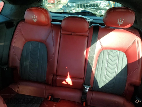 2017 Maserati Levante S z VIN ZN661YUL9HX199934, wystawiony jako Copart lot #83960574 z przebiegiem 75 078 mil mil oraz Szkoda całkowita • Salvage title. Historia ofert i sprzedaży dostępna na DreamBid. Obrazek 10.