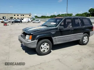 1995 Jeep Grand Cherokee Laredo z VIN 1J4FX58S9SC534442, wystawiony jako Copart lot #61233725 z przebiegiem 363 688 mil mil oraz Szkoda całkowita • Salvage title. Historia ofert i sprzedaży dostępna na DreamBid. Obrazek 14.