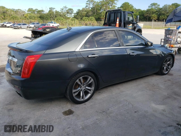 2014 Cadillac CTS Vsport Premium RWD z VIN 1G6AV5S80E0171279, wystawiony jako Copart lot #63759434 z przebiegiem 129 154 mil mil oraz Szkody całkowita. Historia ofert i sprzedaży dostępna na DreamBid. Obrazek 3.