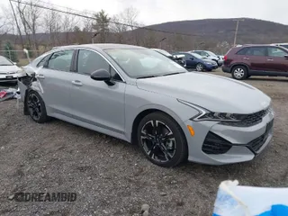 2024 Kia K5 GT-Line z VIN 5XXG64J22RG228095, wystawiony jako IAAI lot #41888510 z przebiegiem 11 927 mil mil oraz . Historia ofert i sprzedaży dostępna na DreamBid. Obrazek 1.