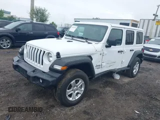 2021 Jeep Wrangler Unlimited Willys with VIN 1C4HJXDG9MW582361, listed as a IAAI auction lot 42243238 with 78,692 mi miles and . Bid and sale history available at DreamBid. Image 17.