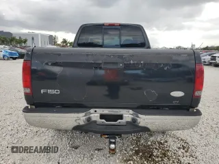 2000 Ford F-150 XL with VIN 1FTZX1721YNC09536, listed as a Copart auction lot 52645405 with 120,638 mi miles and Salvage Title. Bid and sale history available at carsss.com. Image 6.
