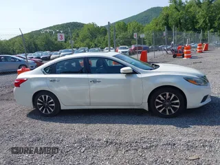 2016 Nissan Altima SR with VIN 1N4AL3APXGC263779, listed as a IAAI auction lot 42356375 with 172,380 mi miles and . Bid and sale history available at DreamBid. Image 13.