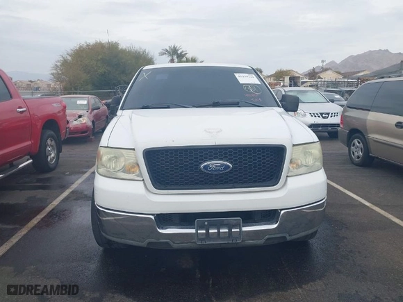 2004 Ford F-150 XL with VIN 1FTPX12574NB21111, listed as a IAAI auction lot 41439224 with 212,887 mi miles. Bid and sale history available at carsss.com. Image 15.