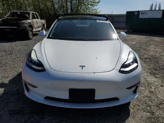 2019 Tesla Model 3 Mid Range with VIN 5YJ3E1EA0KF484178, listed as a Copart auction lot 53121915 with 64,929 mi miles and Salvage Title. Bid and sale history available at DreamBid. Image 5.