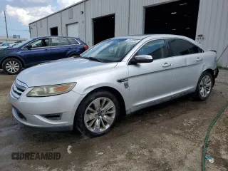 2011 Ford Taurus Limited z VIN 1FAHP2FW6BG115563, wystawiony jako Copart lot #58593655 z przebiegiem 207 414 mil mil oraz Szkoda całkowita • Salvage title. Historia ofert i sprzedaży dostępna na DreamBid. Obrazek 1.