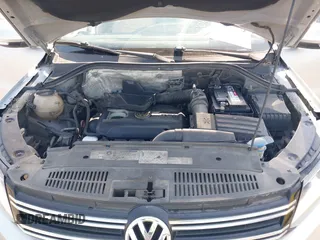 2012 Volkswagen Tiguan SE with VIN WVGAV7AX9CW581957, listed as a IAAI auction lot 42407148 with 135,553 mi miles and . Bid and sale history available at DreamBid. Image 10.