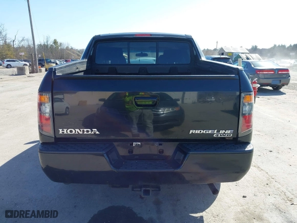 2008 Honda Ridgeline RTX with VIN 2HJYK16308H527737, listed as a IAAI auction lot 41793209 with 200,929 mi miles. Bid and sale history available at carsss.com. Image 16.