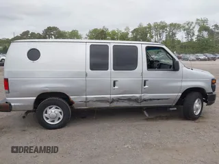 2014 Ford Econoline Cargo Commercial z VIN 1FTNE2EW7EDA73625, wystawiony jako IAAI lot #42290321 z przebiegiem 161 911 mil mil oraz . Historia ofert i sprzedaży dostępna na DreamBid. Obrazek 13.