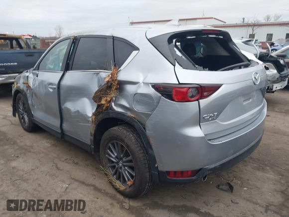 2021 Mazda CX-5 Touring with VIN JM3KFBCM7M0356685, listed as a IAAI auction lot 41136689 with 45,224 mi miles. Bid and sale history available at carsss.com. Image 3.