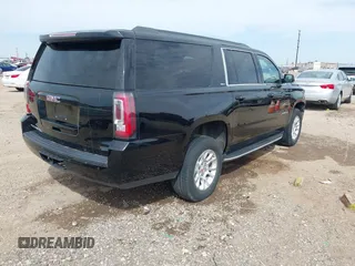 2018 GMC Yukon XL SLT with VIN 1GKS1GKC3JR223544, listed as a IAAI auction lot 41822836 with 164,430 mi miles and . Bid and sale history available at carsss.com. Image 4.