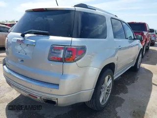 2014 GMC Acadia Denali z VIN 1GKKRTKD0EJ192610, wystawiony jako IAAI lot #41819095 z przebiegiem 121 075 mil mil oraz . Historia ofert i sprzedaży dostępna na DreamBid. Obrazek 4.