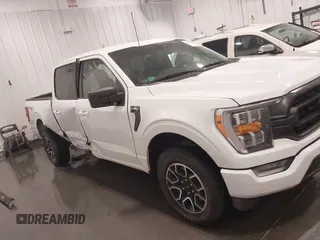 2023 Ford F-150 XL z VIN 1FTFW1E85PFA54558, wystawiony jako IAAI lot #42215749 z przebiegiem 22 476 mil mil oraz . Historia ofert i sprzedaży dostępna na DreamBid. Obrazek 14.