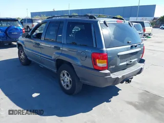 2001 Jeep Grand Cherokee Laredo with VIN 1J4GW48S31C550460, listed as a IAAI auction lot 42769410 with 261,640 mi miles and . Bid and sale history available at DreamBid. Image 3.
